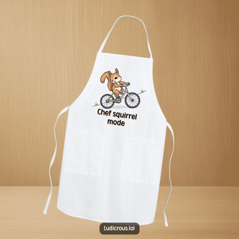 Funny squirrel furiously pedaling a miniature bicycle uphill on a durable apron, adding determination and humor to kitchen tasks.