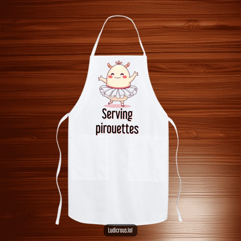 Funny apron design of a happy blob monster wearing a ballet tutu, attempting a ballet pose while standing in a kitchen setting.