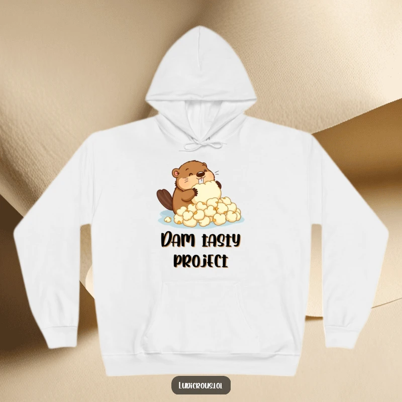 Funny hoodie with a determined beaver trying to construct a dam out of oversized popcorn, a hilarious and cozy gift.