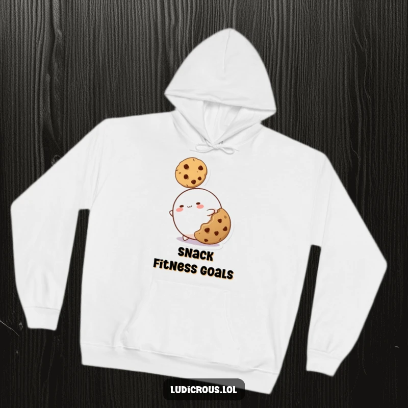 Funny hoodie displaying a stretchy blob character's comical attempt to grab a cookie, evoking relatable hunger and humor.