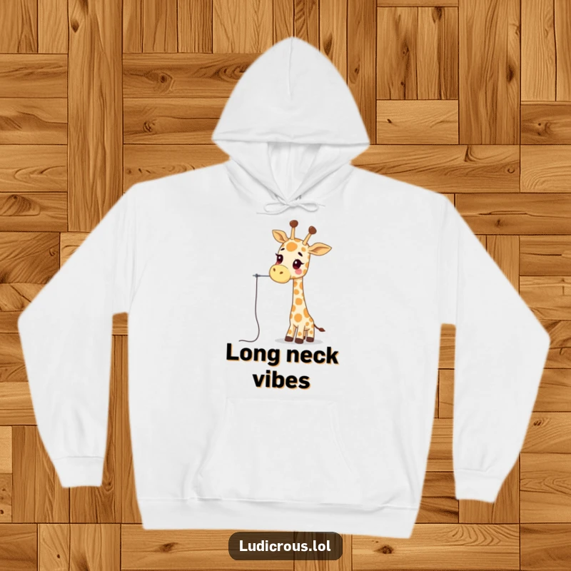 Funny giraffe hoodie showing a wobbly giraffe character attempting to thread a needle with its long neck, a humorous and warm clothing item.