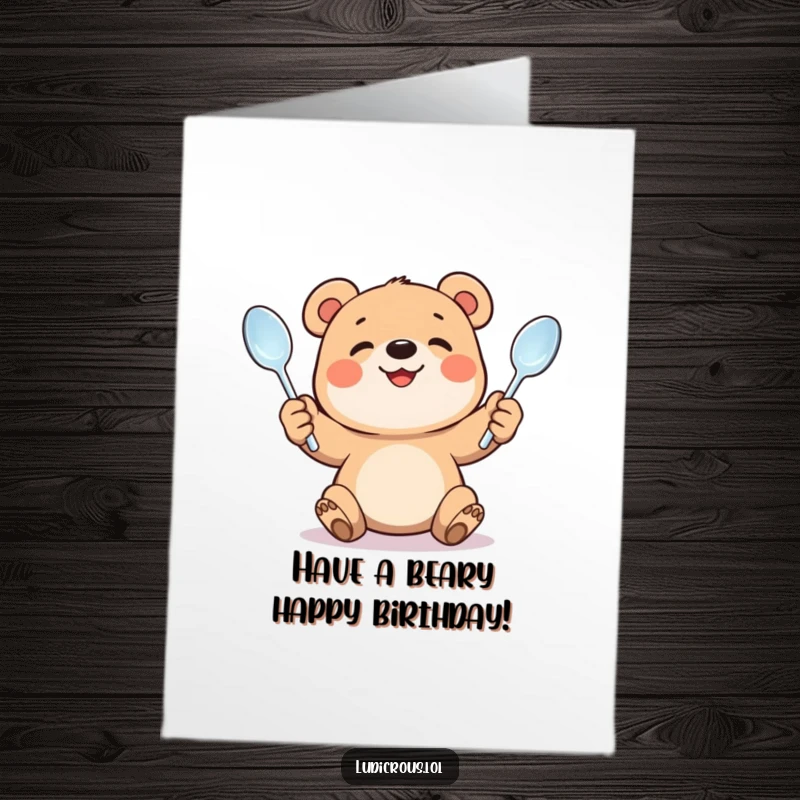 Funny Free Printable Birthday Card: A smiling bear cub strains with effort juggling three comically bent spoons, celebrating a birthday.
