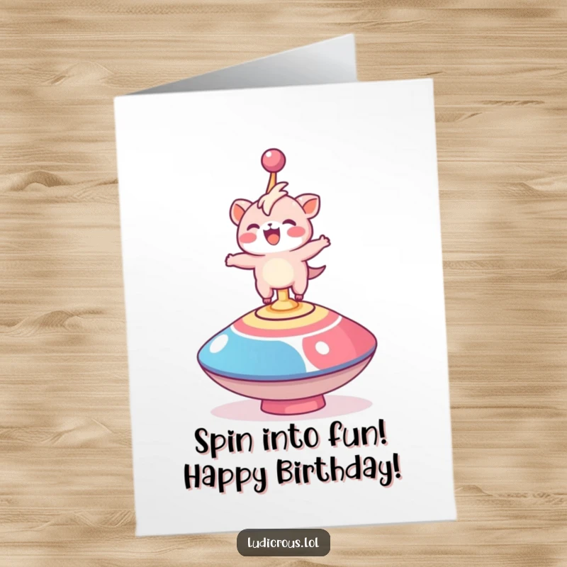 Funny Free Printable Birthday Card: A delighted creature precariously balances on a giant, fast-spinning top, ready to download.