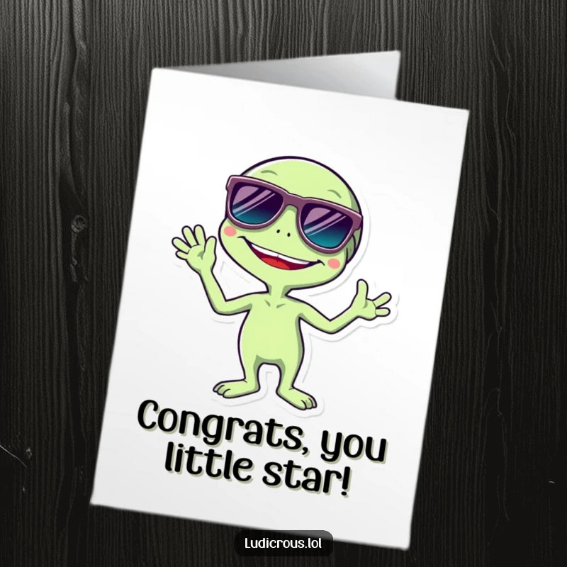 Free Printable congratulations card with a giggling alien sporting large sunglasses and waving excitedly, space theme.