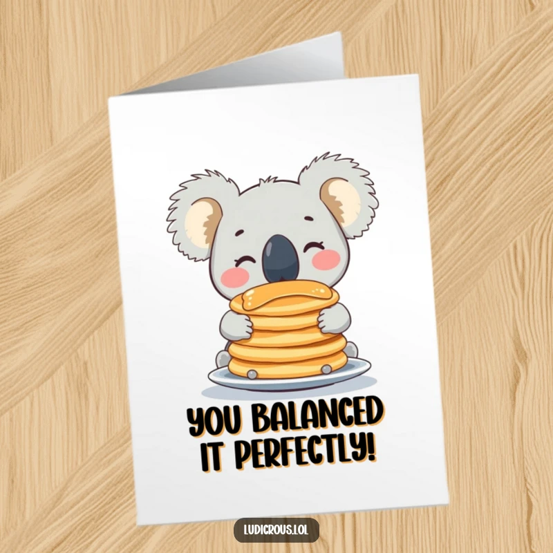 Funny free printable congratulations card showing a koala expertly balancing a tower of pancakes on its snout.