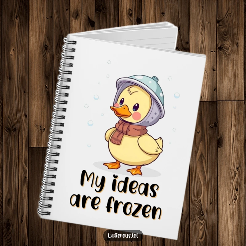 Funny notebook cover with a duck wearing a colander helmet, humorously catching snowflakes, great for journaling or note-taking.