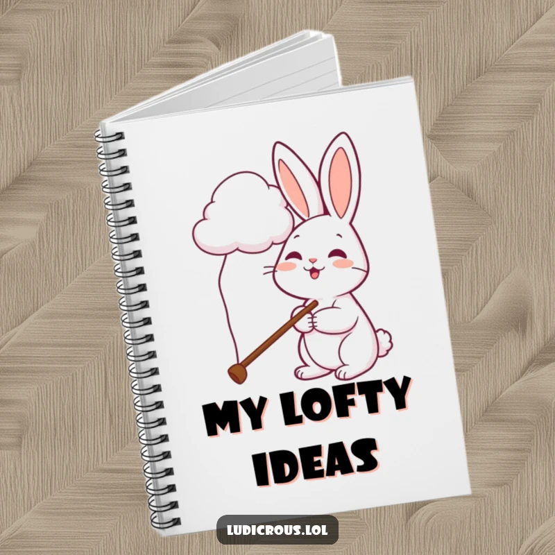 Funny rabbit notebook shows a cheerful bunny with a long pole reaching for a cloud, ready for your notes.