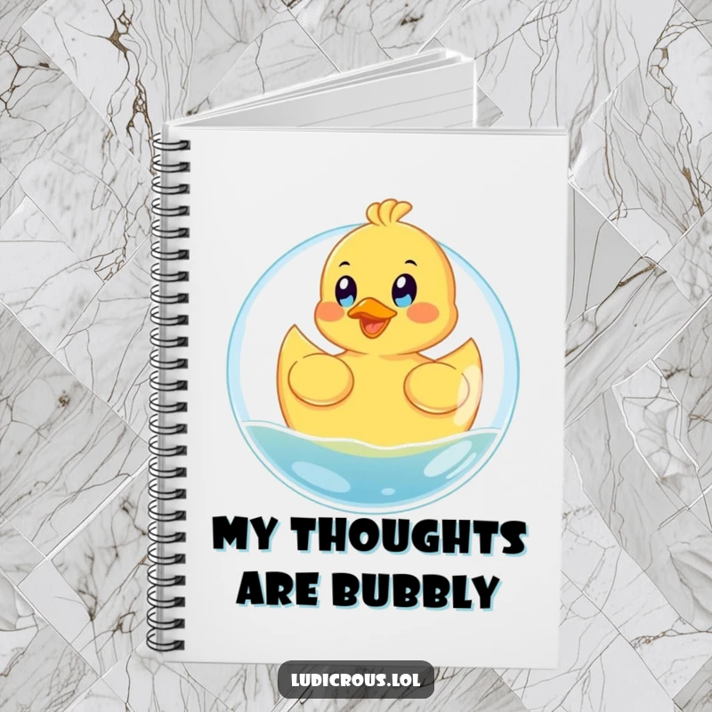 Funny notebook with a happy rubber ducky floating on a giant bubble with eyes wide with glee, perfect for jotting thoughts.