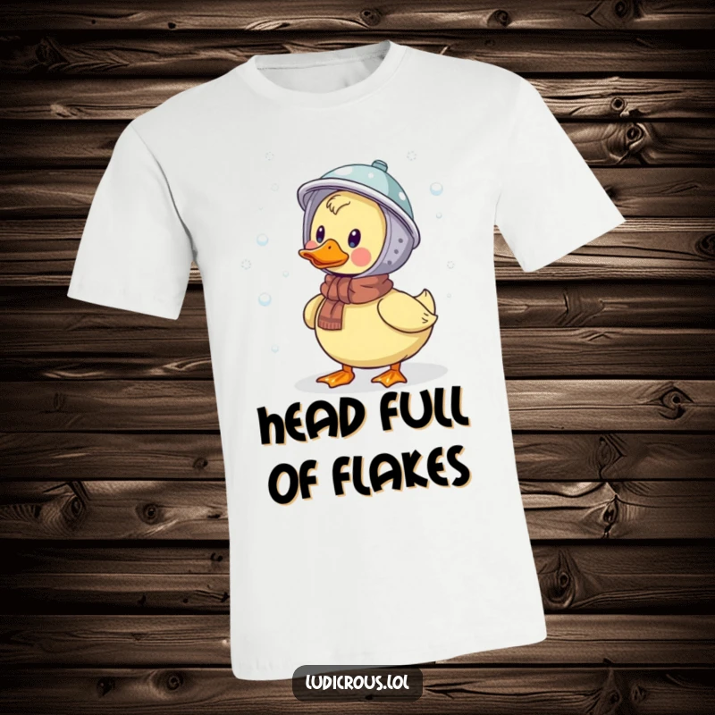 Funny t-shirt graphic of a duck wearing a colander helmet, comically trying to catch falling snowflakes in a winter wonderland.