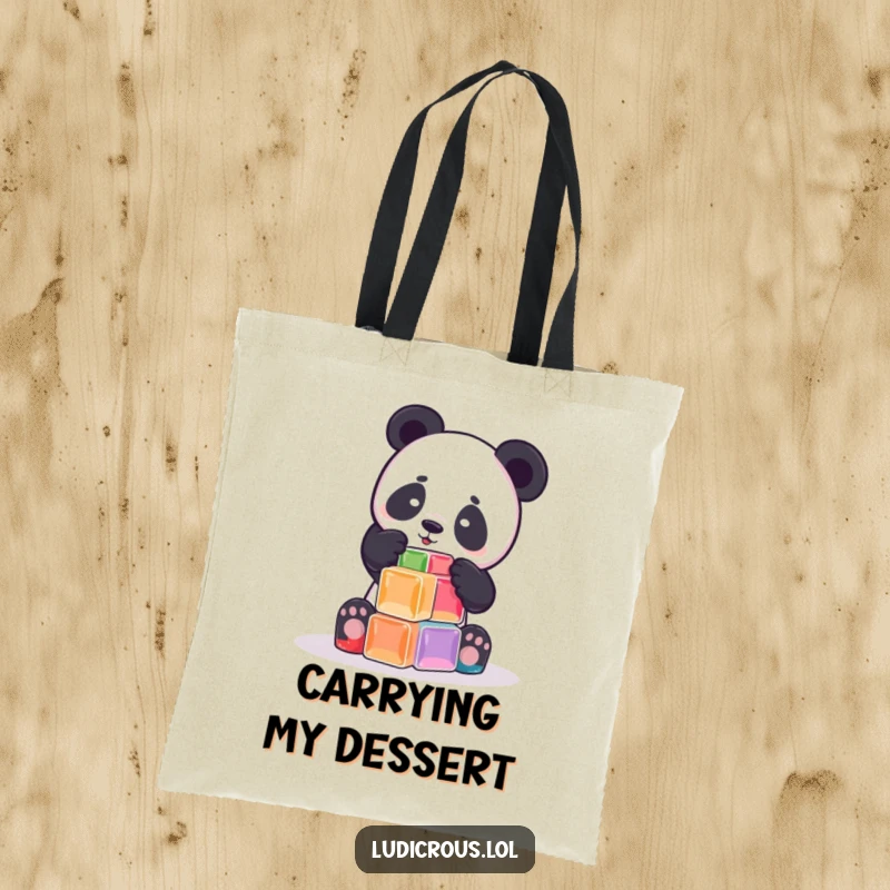 Funny playful panda attempts to build a tower out of wobbly Jell-O cubes on a tote bag, perfect for carrying items with sweet humor.