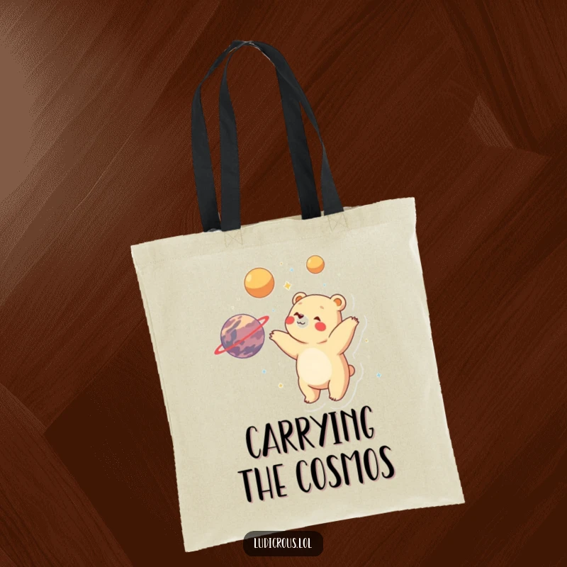 Funny bear joyfully juggling planets with visible delight and wonder, featured on a durable and spacious tote bag.