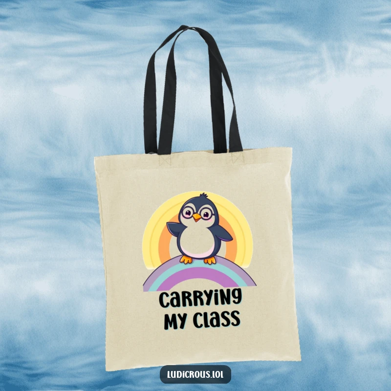 Funny Penguin Tote Bag, a happy penguin wearing a monocle, sliding down a rainbow, perfect for carrying essentials.